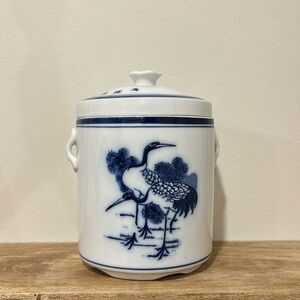 Blue and white canister